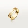 C De Cartier vigselring, 5 mm bredd, 1 diamant C De Cartier vigselring, 5 mm bredd, 1 diamant