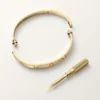 Kärleksarmband, klassisk modell, 4 diamanter Kärleksarmband, klassisk modell, 4 diamanter