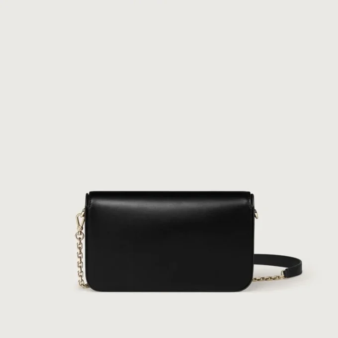 Mini-kedjeväska, Double C De Cartier – svart kalvskinn, guld- och svart emaljfinish – Cartier Mini-kedjeväska, Double C De Cartier – svart kalvskinn, guld- och svart emaljfinish – Cartier