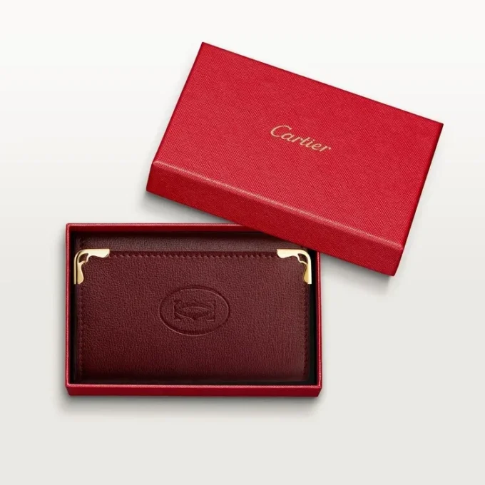 Nyckelring med 6 nycklar, Must De Cartier – vinrött kalvskinn, guldfärgad finish – Cartier Nyckelring med 6 nycklar, Must De Cartier – vinrött kalvskinn, guldfärgad finish – Cartier
