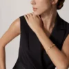 Panthere De Cartier-armband – gult guld, lack, diamant, tsavoritgranat, onyx – Cartier Panthere De Cartier-armband – gult guld, lack, diamant, tsavoritgranat, onyx – Cartier