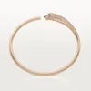 Panthere De Cartier-armband, liten modell, halvpavé