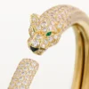 Panthere De Cartier-armband, liten modell, halvpavé