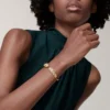 Panthere De Cartier-armband, medelstor modell, halvpavé