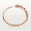 Panthere De Cartier-armband, medelstor modell, halvpavé