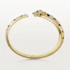 Panthere De Cartier-armband, medelstor modell, halvpavé