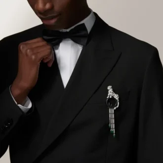 Panthere De Cartier-brosch – vitguld, smaragder, onyx, diamanter – Cartier