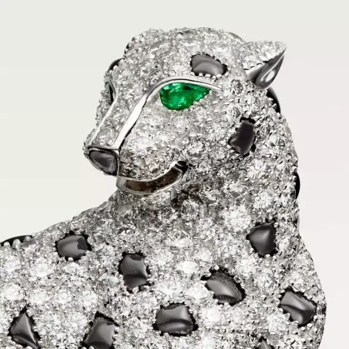 Panthere De Cartier-brosch – vitguld, smaragder, onyx, diamanter – Cartier