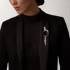 Panthere De Cartier-brosch – vitguld, smaragder, onyx, diamanter – Cartier Panthere De Cartier-brosch – vitguld, smaragder, onyx, diamanter – Cartier
