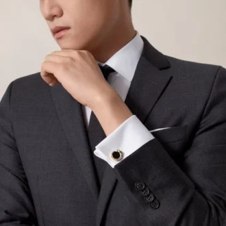 Panthere De Cartier manschettknappar – gult guld, onyx, tsavoriter och svart lack – Cartier