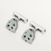 Panthere De Cartier manschettknappar – rodierat vitt guld, diamanter, smaragder, onyx – Cartier Panthere De Cartier manschettknappar – rodierat vitt guld, diamanter, smaragder, onyx – Cartier