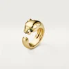 Panthere De Cartier-ring – gult guld, onyx, tsavoritgranat – Cartier