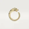 Panthere De Cartier-ring – gult guld, smaragder, onyx, diamanter – Cartier