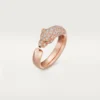 Panthere De Cartier-ring – roséguld, onyx, smaragder, diamanter – Cartier