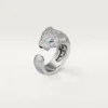 Panthere De Cartier-ring – vitguld, diamanter, smaragder, onyx – Cartier