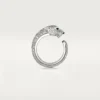 Panthere De Cartier-ring – vitguld, diamanter, smaragder, onyx – Cartier
