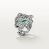 Panthere De Cartier-ring – vitguld, smaragder, onyx, diamanter – Cartier