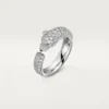 Panthere De Cartier-ring – vitguld, smaragder, onyx, diamanter – Cartier Panthere De Cartier-ring – vitguld, smaragder, onyx, diamanter – Cartier