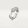 Panthere De Cartier-ring – vitguld, smaragder, onyx, diamanter – Cartier