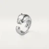 Panthere De Cartier-ring – vitguld, tsavoritgranater, onyx – Cartier Panthere De Cartier-ring – vitguld, tsavoritgranater, onyx – Cartier