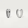 Panthere Diamond små hoop-örhängen, vitguld | Cartier Us Panthere Diamond små hoop-örhängen, vitguld | Cartier Us