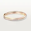 Trinity-armband i trefärgat guld, klassisk modell | Cartier Us Trinity-armband i trefärgat guld, klassisk modell | Cartier Us