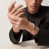 Trinity-armband i trefärgat guld, klassisk modell | Cartier Us Trinity-armband i trefärgat guld, klassisk modell | Cartier Us