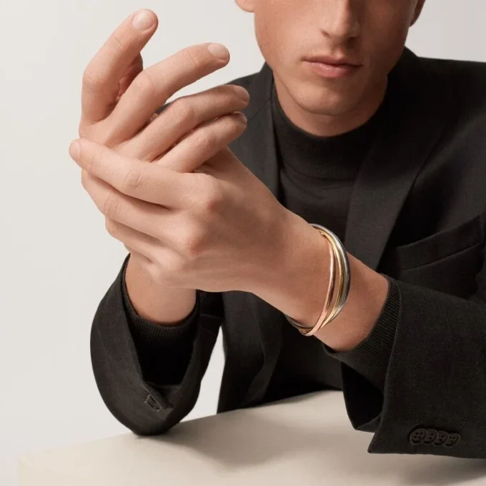 Trinity-armband i trefärgat guld, klassisk modell | Cartier Us Trinity-armband i trefärgat guld, klassisk modell | Cartier Us