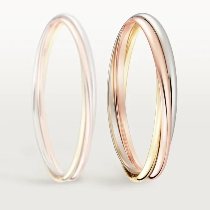 Trinity-armband i trefärgat guld, klassisk modell | Cartier Us Trinity-armband i trefärgat guld, klassisk modell | Cartier Us