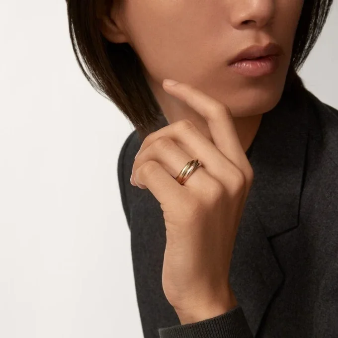 Trinity-ring i trefärgat guld, klassisk modell | Cartier Us Trinity-ring i trefärgat guld, klassisk modell | Cartier Us