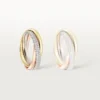 Trinity-ring, liten modell, halvpavé Trinity-ring, liten modell, halvpavé